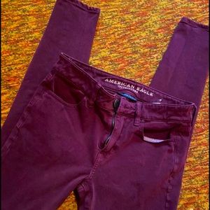 American Eagle maroon skinny jeans
